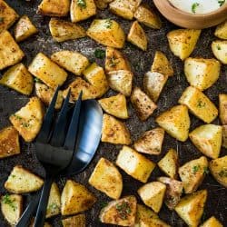 Oven Roasted Garlic Potatoes - crispy on the outside and fluffy inside. The garlic and spices add delicious savory flavor with every bite.#mustlovehomecooking #ovenpotatoes