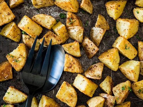 Oven Roasted Garlic Potatoes - crispy on the outside and fluffy inside. The garlic and spices add delicious savory flavor with every bite.#mustlovehomecooking #ovenpotatoes