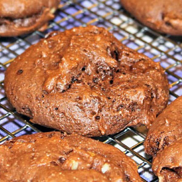 Double Chocolate Walnut Cookies are delicious fudgy cake mix cookies, chock full of chocolate chips and walnuts. Easiest one bowl recipe! #mustlovehomecooking