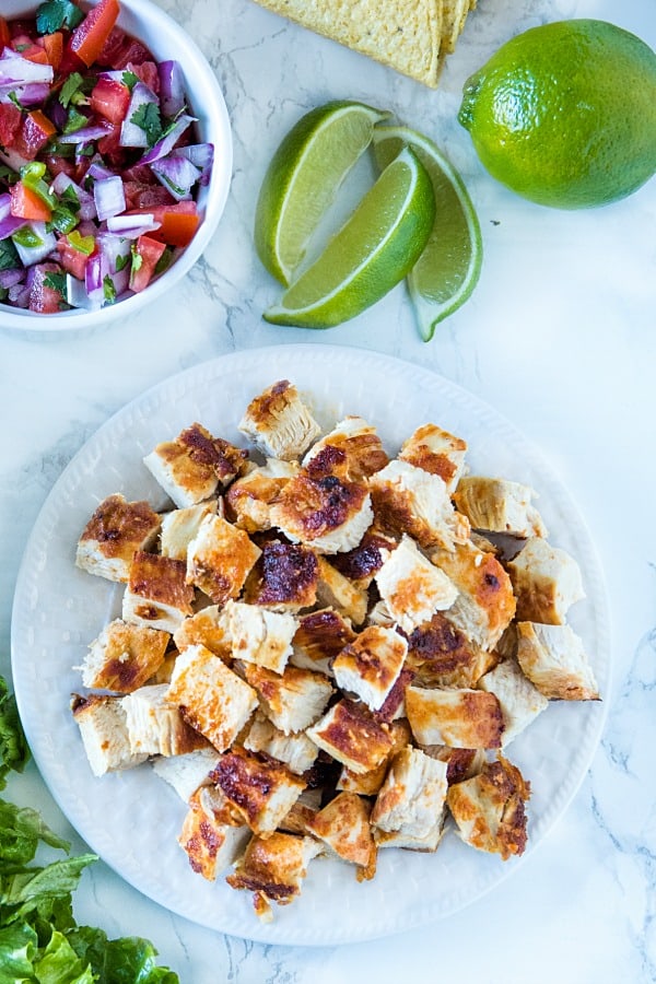 Lime Marinated Chicken Tacos are grilled, fresh lime marinated chicken breasts stuffed into crunchy taco shells and loaded with your favorite toppings. #mustlovehomecooking #mexicanfood #tacorecipes