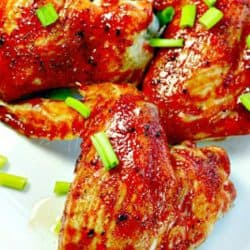 Crispy, fiery Asian Chicken Wings slathered with a combination of three different hot sauces - perfect smokin' hot wings every time!