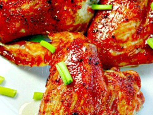 Crispy, fiery Asian Chicken Wings slathered with a combination of three different hot sauces - perfect smokin' hot wings every time!