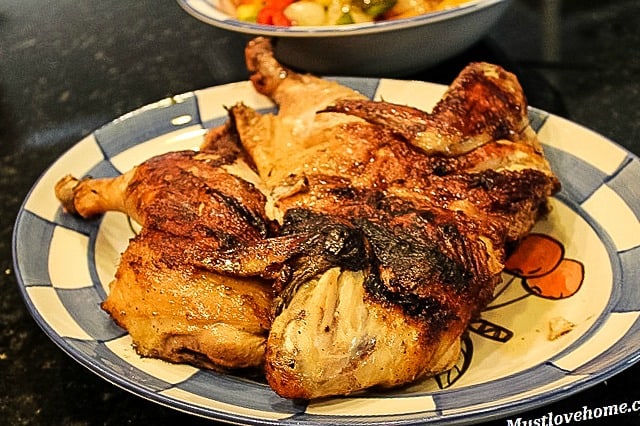 Crispy Chicken Under a Brick - seared and pressed on the grill under a heavy weight, making chicken that is crunchy on the outside with tender juices inside.