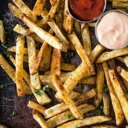 Crispy Garlic Matchstick Fries are amazingly crisp and flavorful oven baked fries seasoned with garlic.. #mustlovehomecooking #frenchfries #potatoes