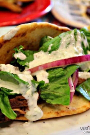 These are crazy good Gyros. Succulent marinated beef, covered in tangy tzatziki sauce and wrapped in a warm flatbread...so so good! You can make bistro quality food right in your own kitchen!!