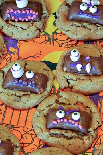 Butterfinger Ghoul Cookies are a tasty peanut butter and candy cookie treat decorated with ghoulish candy faces!