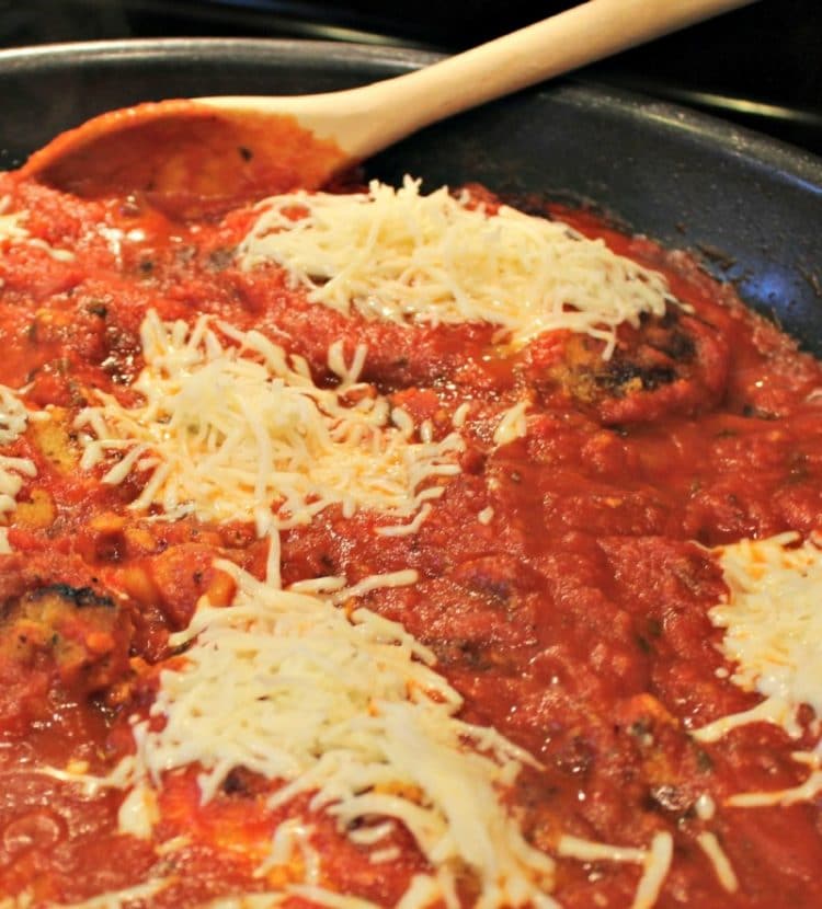 Make this One Skillet Chicken Parmesan Dinner and you will feel like you are in Italian Restaurant. Moist chicken, pasta sauce, spices, pasta and cheese combine to make this an easy dinner favorite.
