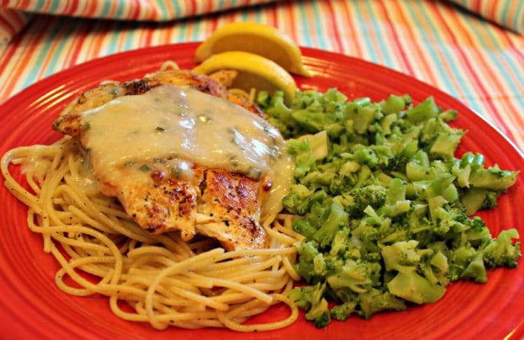 You will love this AMAZING recipe for Chicken with a creamy lemon sauce. Pan seared juicy chicken is topped with a frothy light lemon sauce flavored with chives! This recipe proves that you can have Bistro flavor from your own kitchen! Try this tonight and see for yourself!