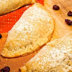 Apple Cranberry Pocket Pies are apple pie filling mixed with tart dried cranberries, baked in refrigerated pie dough.