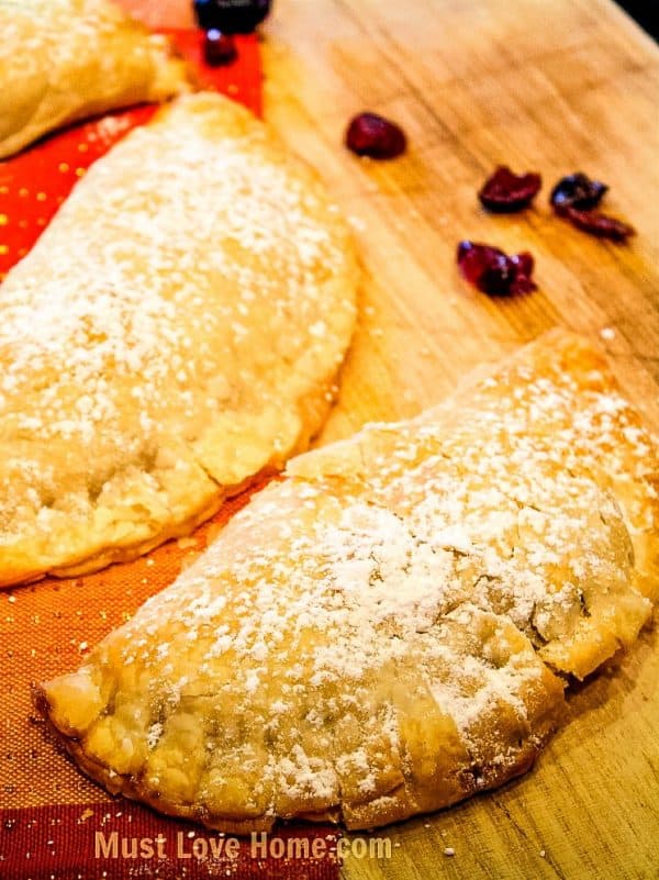 Apple Cranberry Pocket Pies - easy to make individual pies with dried cranberries and apple pie filling! Great for fall.