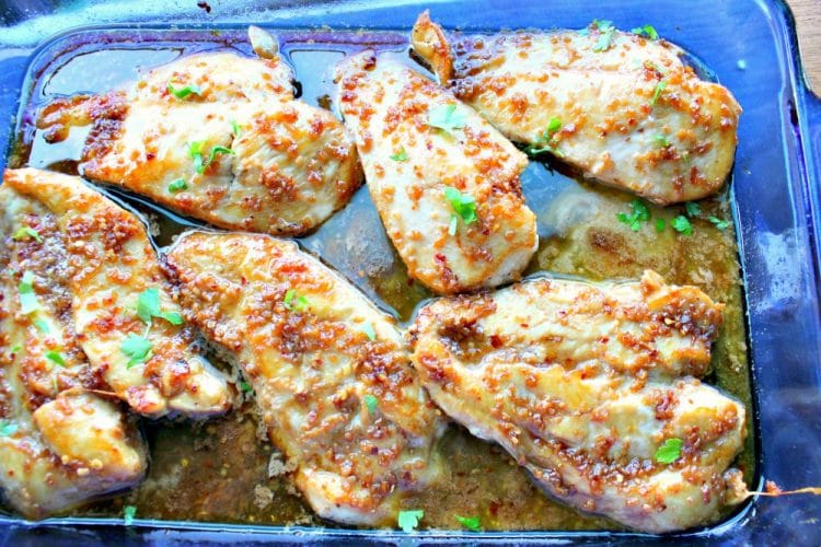 Garlic and Honey Chicken is the BEST EVER recipe for chicken breasts! Seared to perfection, then baked with a buttery sauce, the chicken remains moist and flavorful! Less than 30 minutes from refrigerator to table!