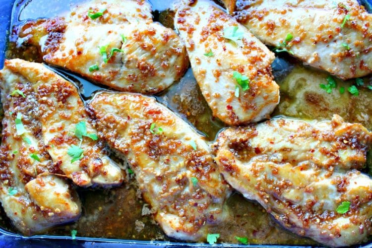 Garlic and Honey Chicken is the BEST EVER recipe for chicken breasts! Seared to perfection, then baked with a buttery sauce, the chicken remains moist and flavorful! Less than 30 minutes from refrigerator to table!
