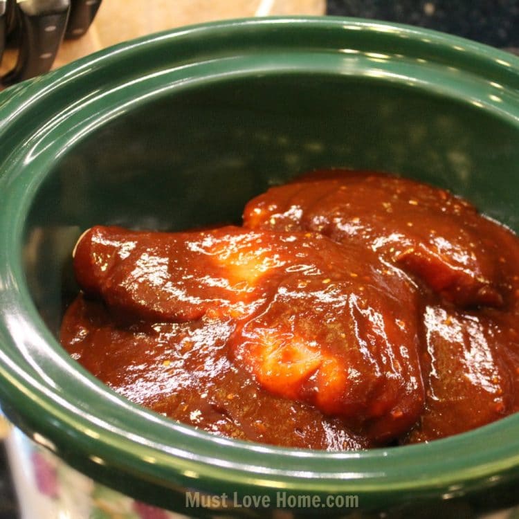 This is the Best Slow Cooker Pulled BBQ Chicken! Fall-apart tender, juicy and delicious! The flavor will make you want to keep coming back for more! | mustlovehome.com