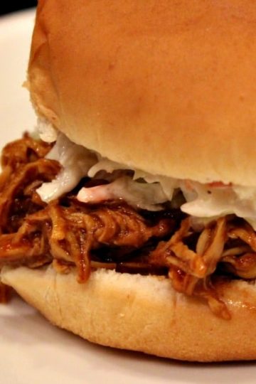 This is the Best Slow Cooker Pulled BBQ Chicken! Fall-apart tender, juicy and delicious! The flavor will make you want to keep coming back for more! | mustlovehome.com