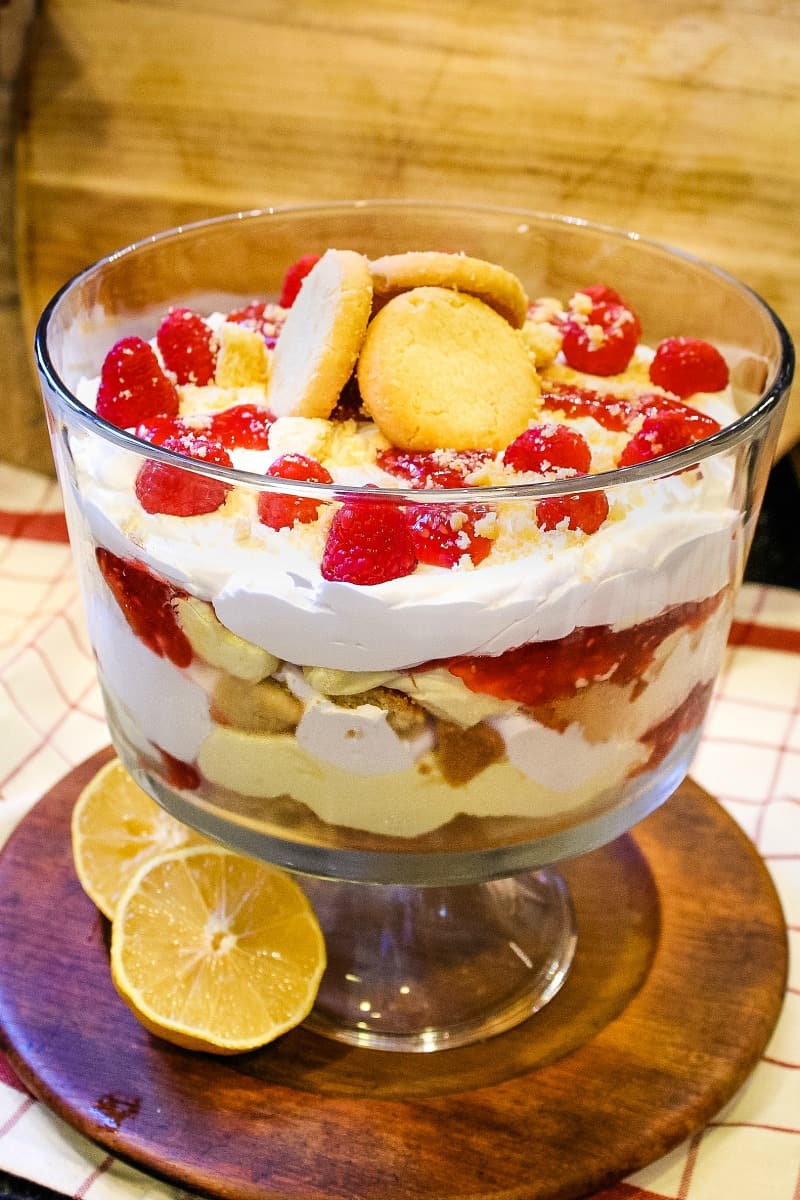 Lemon Raspberry Trifle is an easy to make classic favorite with fresh raspberries, whipped topping and buttery shortbread cookies. It's the perfect showcase dessert for parties and potlucks.