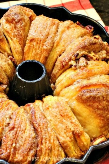 This is flat out the most AMAZING Cinnamon Walnut Monkey Bread recipe ever! You just need 5 simple ingredients to be in Breakfast, Brunch, Dinner or anytime Heaven! Do not eat this alone, you will finish the entire pan yourself!!