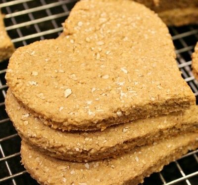 Homemade Apple Peanut Butter Dog Treats are amazingly healthy - with no sugar like you find in store bought! Just mix, roll, cut and bake! They are Dog tested - Mom approved!!