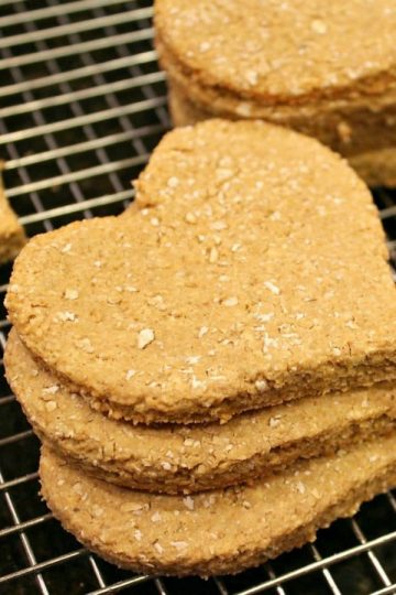 Homemade Apple Peanut Butter Dog Treats are amazingly healthy - with no sugar like you find in store bought!   Just mix, roll, cut and bake! They are Dog tested - Mom approved!!