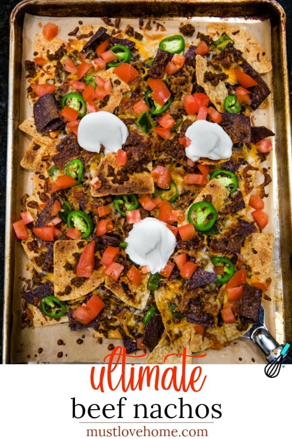 Ultimate Beef Nachos are oven crispy tortilla chips drenched in melted cheese, spicy meat and peppers. Perfect for game day, parties and a sheet pan dinner.