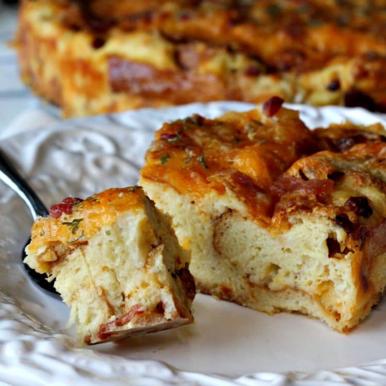 Cheddar Bacon Strata is a savory bread pudding/cake made with just 5 ingredients. Eggs, Bacon, cheese, bread and milk are what you need to make this delicious and gorgeous Strata. The Strata can be made a day ahead of time too! Click over for the complete recipe and easy instructions.