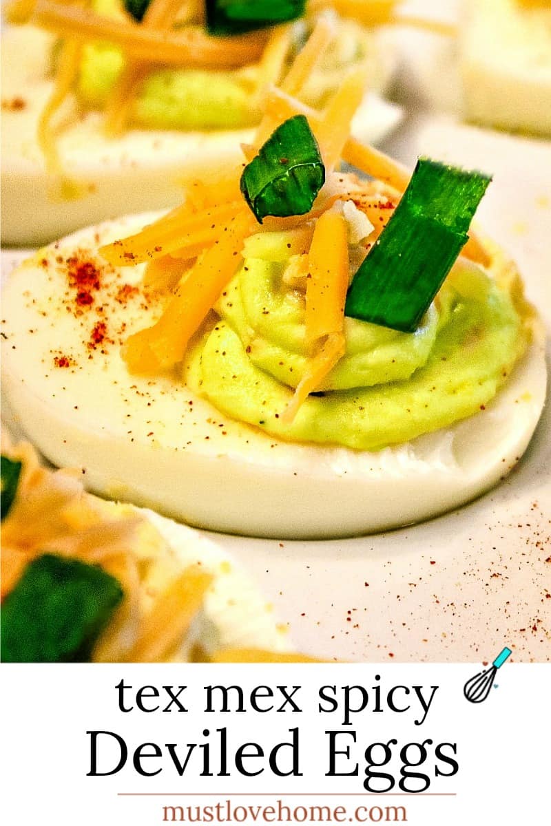 Tex Mex Spicy Deviled Eggs. It's a twist on the classic recipe with cheddar cheese, jalapeno, and chipotle pepper spice. South of the Border never tasted so good!#mustlovehomecooking