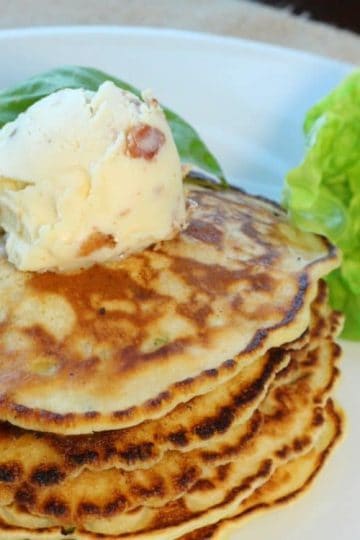 Fresh chopped basil and creamed corn are the simple ingredients make these savory Basil Corn Cakes so moist and flavorful. Served with Maple Bacon Butter, these corn cakes make a perfect and memorable brunch or side dish.