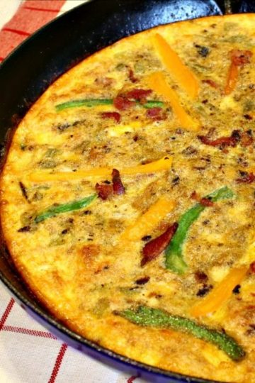 A Southwest Bacon Frittata, on the table in less than 30 minutes! So quick and easy as a weeknight dinner or fancy brunch! And it can be made ahead of time!!