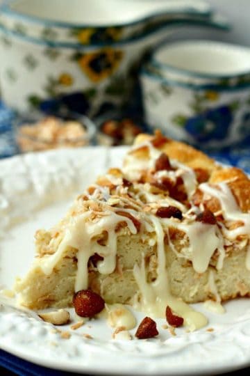 Coconut Almond Bread Pudding made with day old bread, eggs, cream and coconut can be prepped the day before and baked in the morning for a no-fuss weekend breakfast.