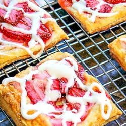Crisp, sugar dusted puff pastry with juicy slices of strawberry baked on top.