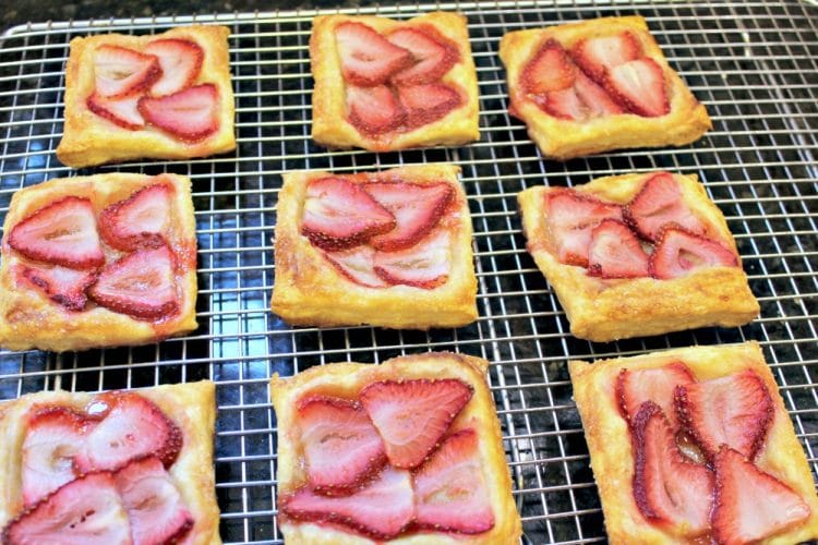 Amazing Fresh Strawberry Pastry is crisp, sugar dusted puff pastry with juicy slices of strawberry baked on top. It's like biting into a cloud of flaky crust and the best strawberry jam you have ever tasted! Easy to make in about 25 minutes - Perfect for brunch or dessert!