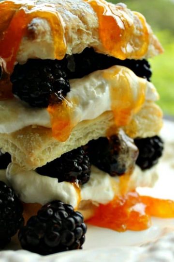 Blackberry Napoleon is a light and airy dessert recipe made from puff pastry, real whipped cream, blackberries and apricot preserves - a gorgeous and tasty finish to any meal!