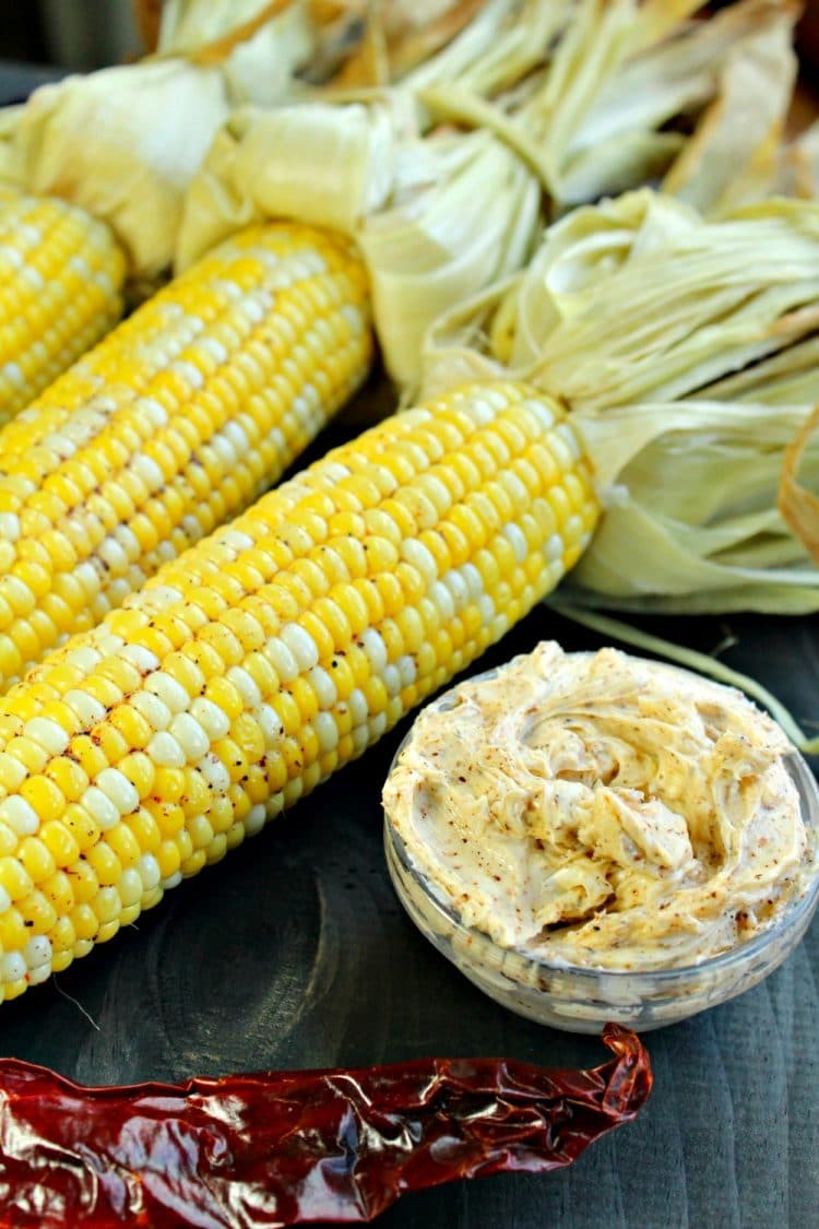 Oven Cob Corn with Chili Butter is roasted cob corn steam cooked in the husk and then smeared with homemade chili butter.