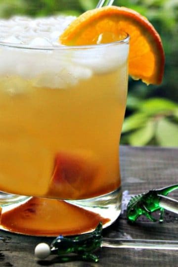 An Orange Ginger Rummy is a simple blend of rum, orange simple syrup and ginger ale - easy to make but tastes so smooth you will think you are being served in a fancy club.