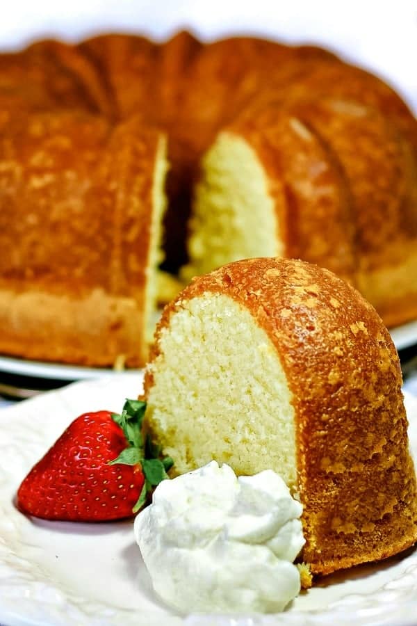 Perfect Pound Cake is buttery and sweet, with a hint of vanilla. This cake is rich, with the flavor of shortbread cookies, but still light as a feather. #mustlovehomecooking