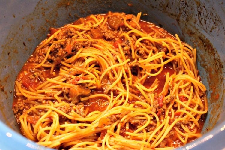 Easy Crock Pot Spaghetti is the real deal - with just beef, pasta , sauce and a few spices it is a cinch to make and full of flavor. This recipe is a definite thumbs up!