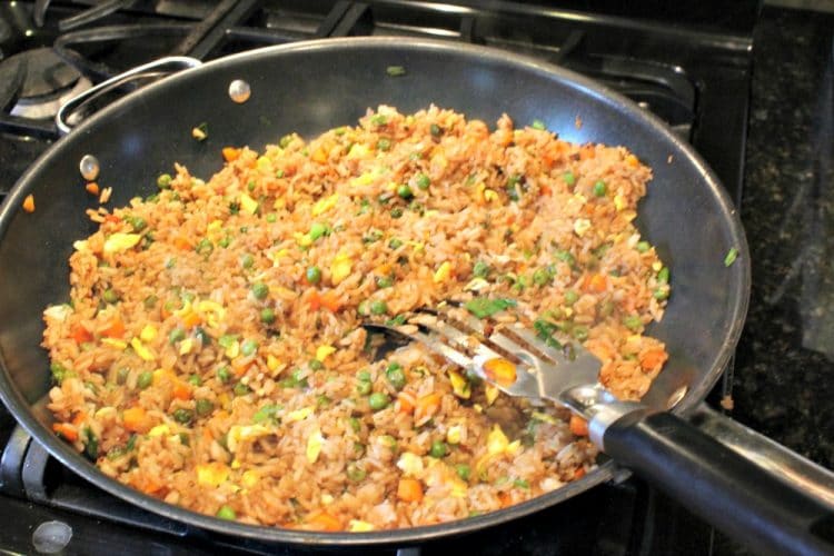 Easy Fried Rice is take-out style rice with loads of flavor that you can make yourself in just minutes! Great for using up leftovers too!!