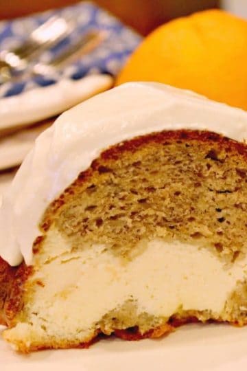 Cream Cheese Banana Bread Bundt Cake is made decadent by adding a luscious cream cheese filling - incredibly light yet so moist and delicious you will want to make it again and again!