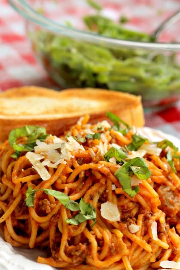 Easy Crock Pot Spaghetti is the real deal - with just beef, pasta , sauce and a few spices it is a cinch to make and full of flavor.
