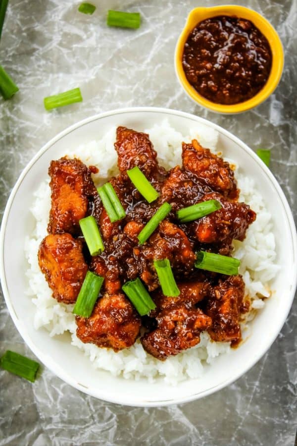 Slow Cooker General Tso Chicken is a favorite Chinese take out dish that is crazy easy to make at home and this tastes even better!