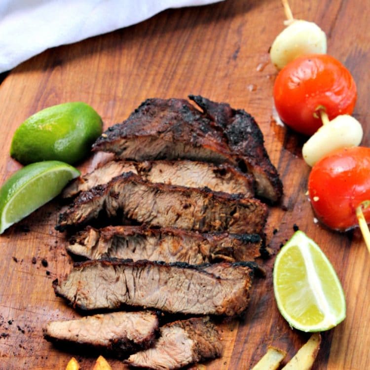 Marinated Southwest Flat Iron Steak - a melt in your mouth Flat Iron Steak that is grilled over high heat. A marinade including chili powder, brown sugar, and garlic is perfect for this cut of meat. Serve with an extra spritz of lime juice and fries!
