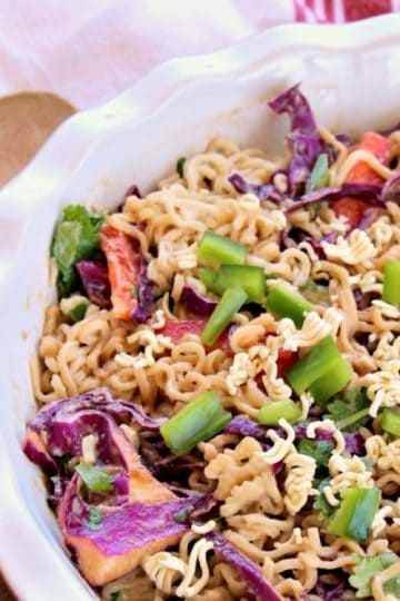 Honey Pepper Ramen Noodle Salad is a cool, crunchy mix of ramen noodles, tangy sauce, fresh peppers and cabbage. The secret is in the honey sauce - and it takes about 15 minutes! A delicious alternative to coleslaw!