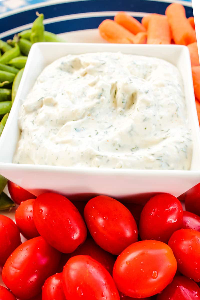 Easy Herb Dill Dip is a smooth, light dip made with only sour cream and seasonings. Perfect for veggies, crackers and chips. #mustlovehomecooking