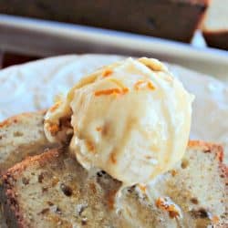 Bananas Foster Bread with rum sauce is a take on the New Orleans classic dessert. Made in the traditional banana bread style, the warm loaf is soaked in rum sauce, then served with more sauce and a scoop of vanilla ice cream. A rich, adult dessert.