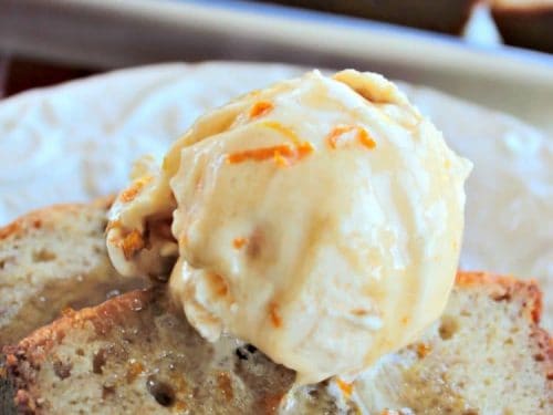 Bananas Foster Bread with rum sauce is a take on the New Orleans classic dessert. Made in the traditional banana bread style, the warm loaf is soaked in rum sauce, then served with more sauce and a scoop of vanilla ice cream. A rich, adult dessert.
