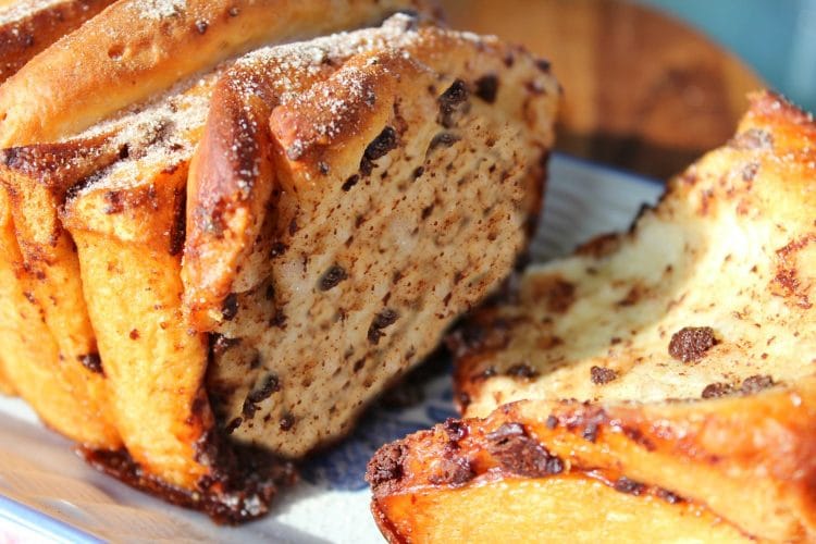 Chocolate Pumpkin Spice Pull Apart Bread is a soft, buttery loaf chock full of autumn flavors. Chocolate chips, pumpkin pie spice and frozen bread dough combine in this easy recipe that anyone can make.