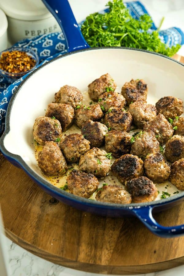 Easy Skillet Meatballs are savory bites of beef, onion, caraway seeds and spices that you can add to pasta, soups or sandwiches for an easy meal. Great for making ahead and freezing. #mustlovehomecooking