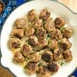 Easy Skillet Meatballs are savory bites of beef, onion, caraway seeds and spices that you can add to pasta, soups or sandwiches for an easy meal. Great for making ahead and freezing. #mustlovehomecooking