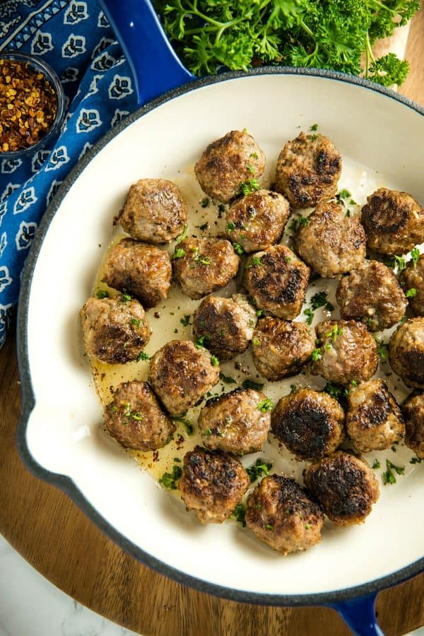 Easy Skillet Meatballs are savory bites of beef, onion, caraway seeds and spices that you can add to pasta, soups or sandwiches for an easy meal. Great for making ahead and freezing.#mustlovehomecooking