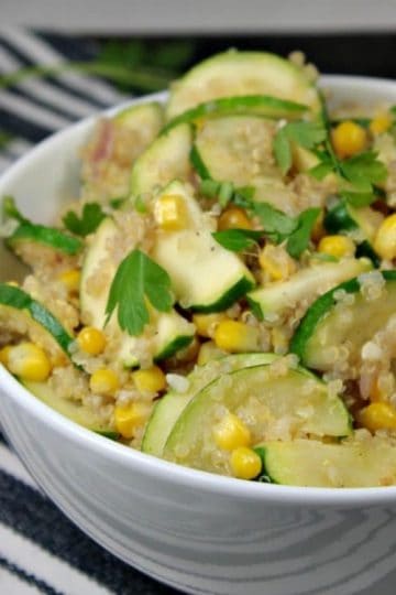 Quinoa Vegetable Medley - the perfect side for a healthy and delicious meal. Fluffy quinoa, corn and zucchini, with a splash of balsamic vinegar compliments any chicken or pork dish, and is hearty enough to be a meal on it's own.