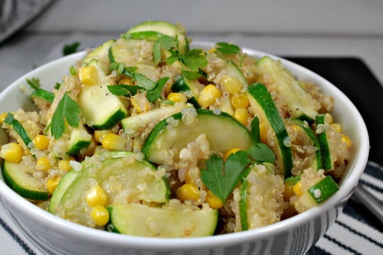 Quinoa Vegetable Medley - the perfect side for a healthy and delicious meal. Fluffy quinoa, corn and zucchini, with a splash of balsamic vinegar compliments any chicken or pork dish, and is hearty enough to be a meal on it's own.